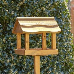 Bird Inn 150cm, stunning wavy edged roof, handcrafted from Swedish redwood.